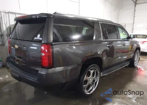 2015 Chevrolet Suburban 1500 Lt z USA, uszkodzony, nr VIN 1GNSKJKCXFR149902